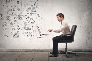young-businessman-working-in-a-virtual-office-1400x934
