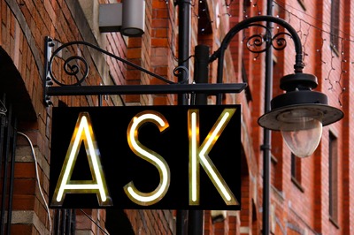 Outside store sign with word ASK
