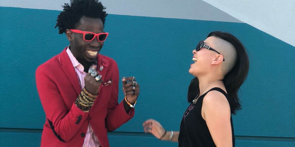 Two happy people laughing.