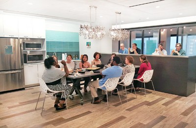 Open office space with kitchenette.