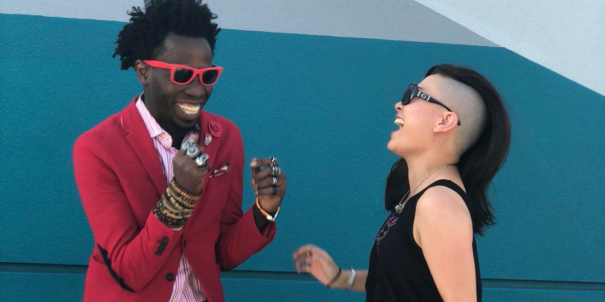 Two happy people laughing.